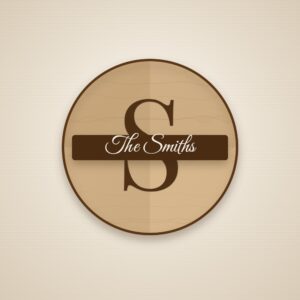 Split monogram laser cut family name wooden sign